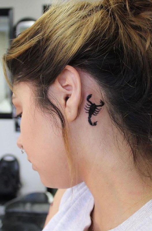 Scorpion neck tattoo for women