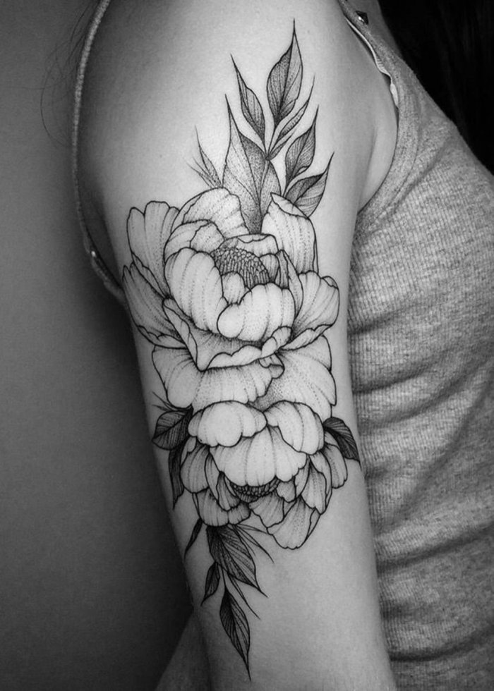 Peony tattoo on the shoulder for women