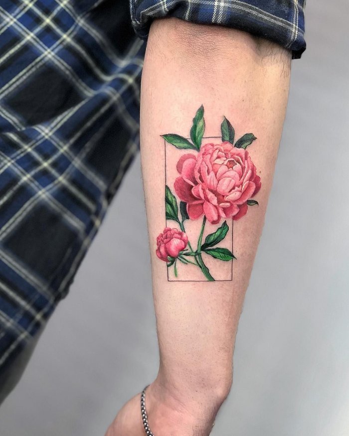 Colored peony tattoo on the forearm for men