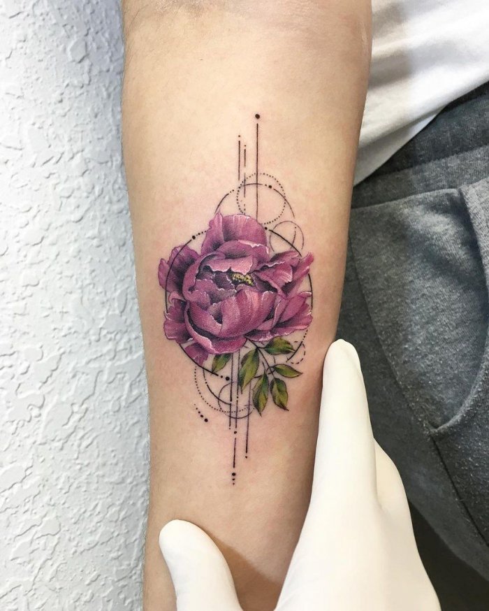 Colored peony tattoo on the forearm for men