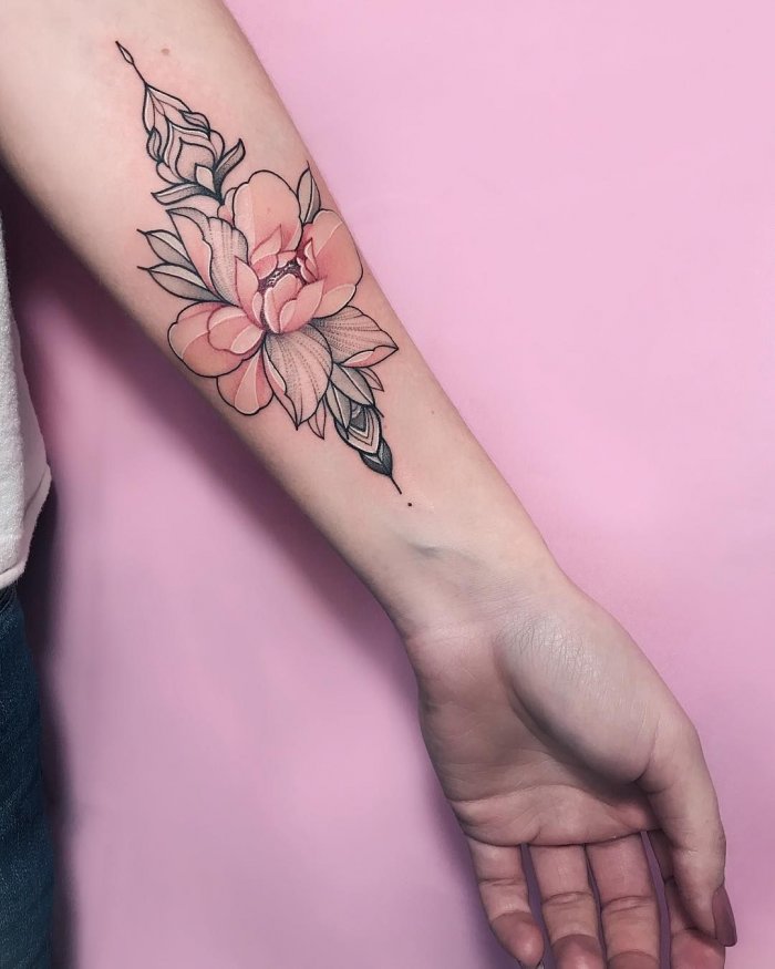 Color tattoo on the forearm for women