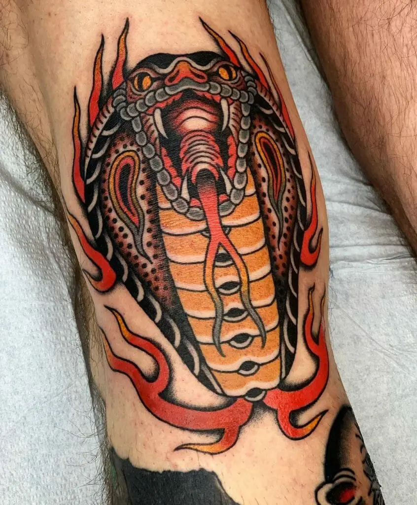 Large cobra tattoo on the leg for men