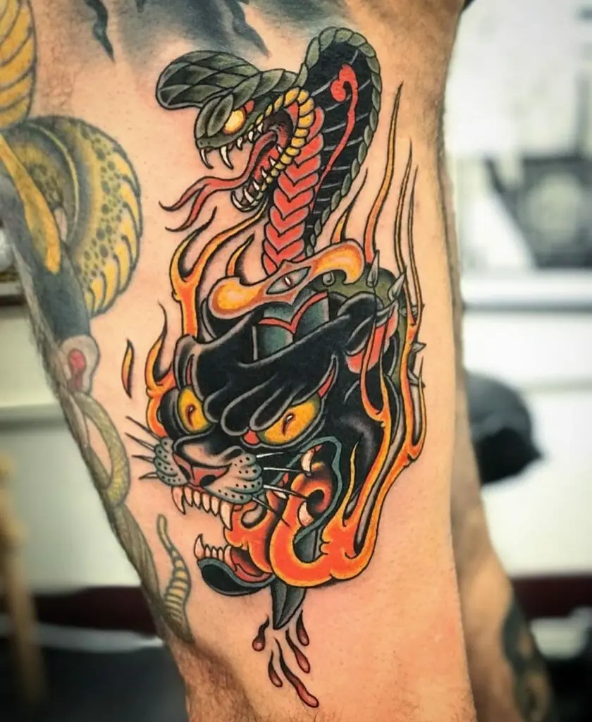 Tattoo of a colored cobra on the hip for men