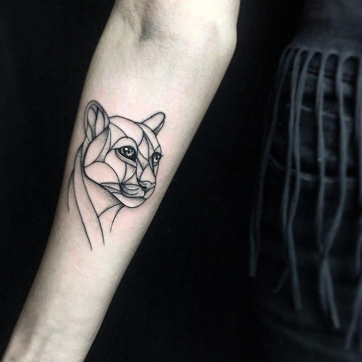 Puma tattoo on the forearm for men