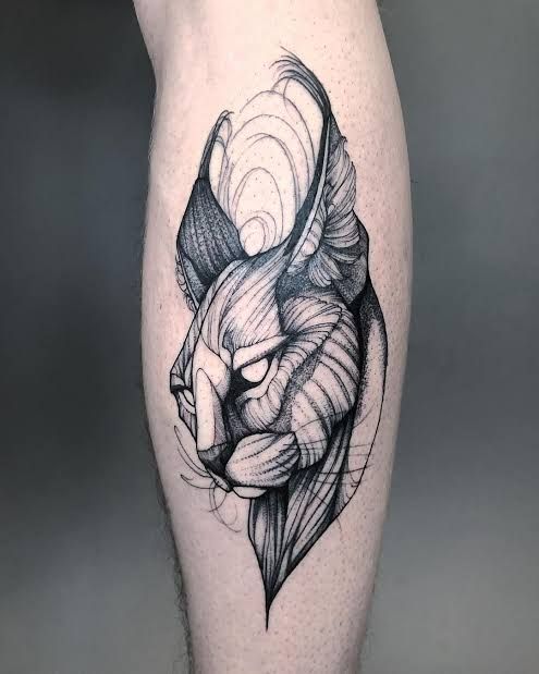 Tattoo of a lynx on a calf for men