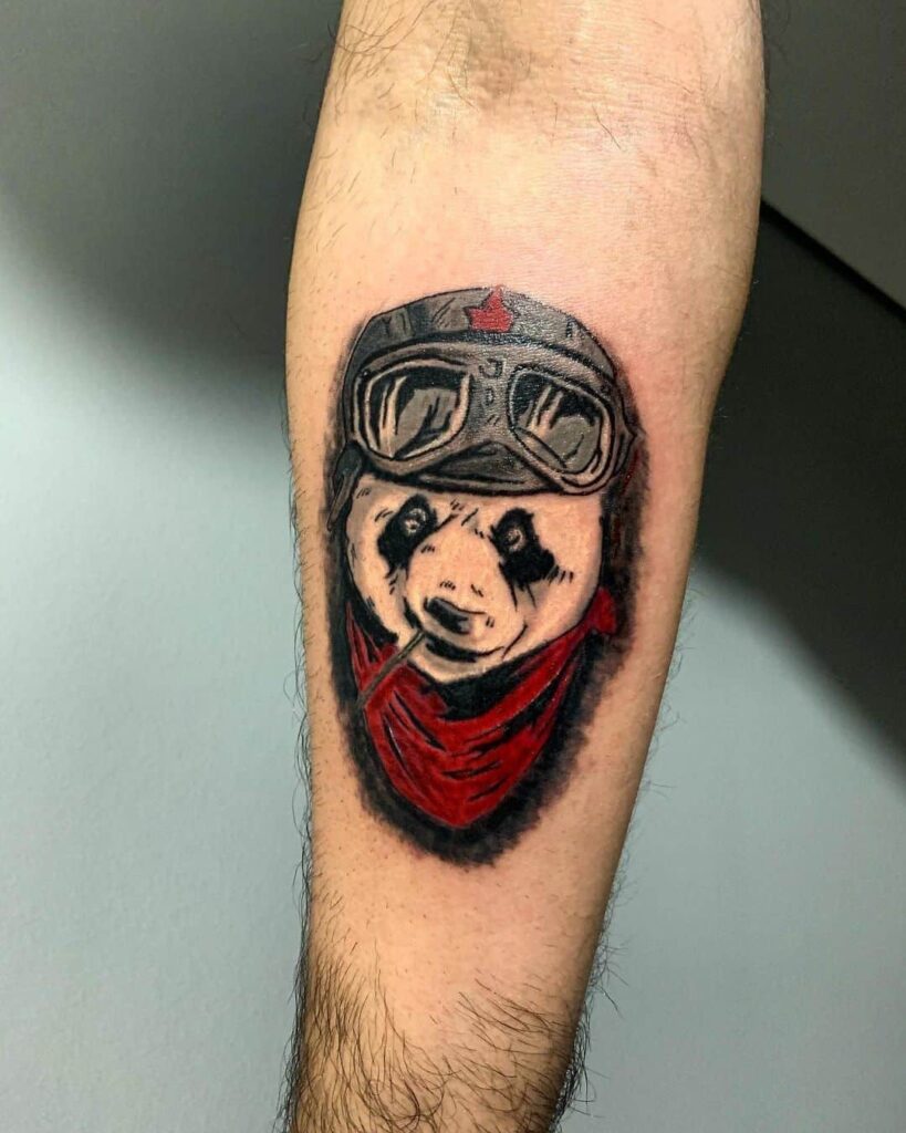 Colored panda tattoo on the forearm for men