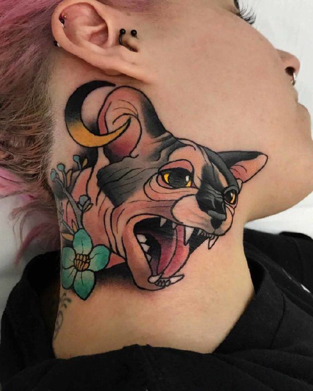 Tattoo of a colored sphinx on the neck for women