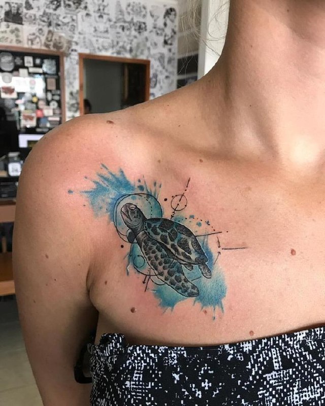 Turtle tattoo on the chest for women