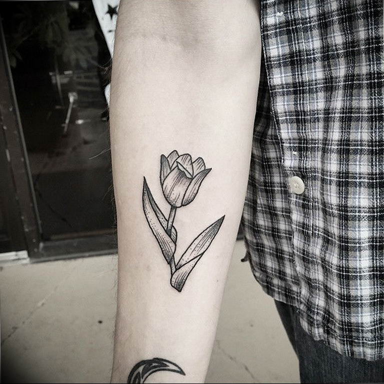 Tulip tattoo on forearm for men