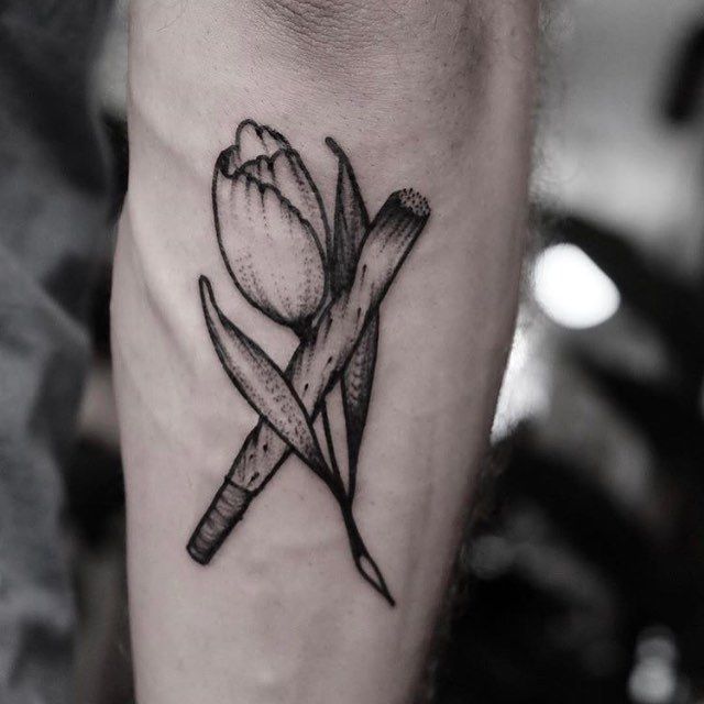 Tulip tattoo on the shin for men