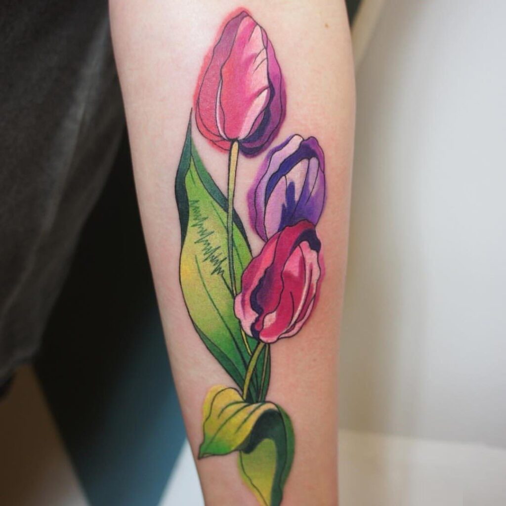 Large tulip tattoo on the forearm for women