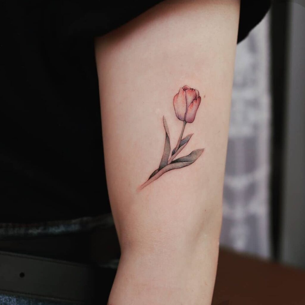 Tulip tattoo on the shoulder for men