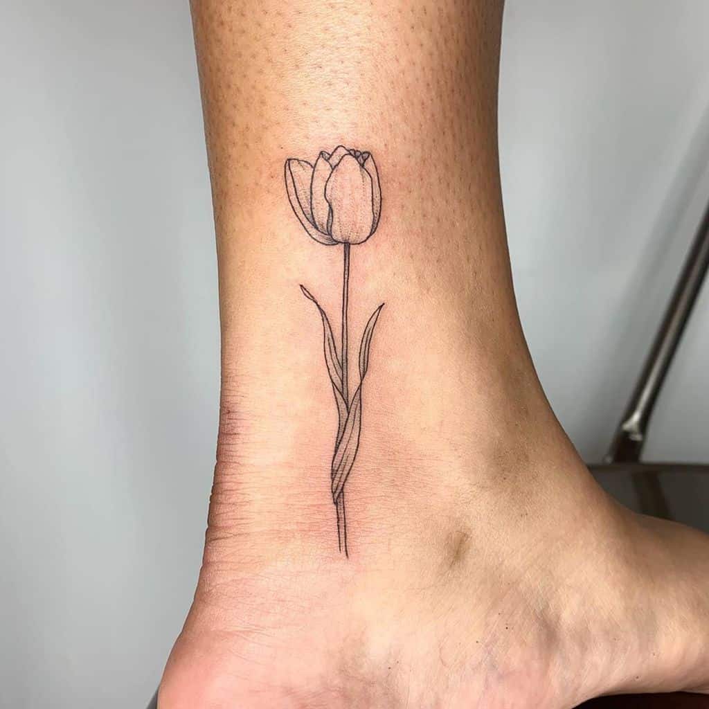 Tulip ankle tattoo for men