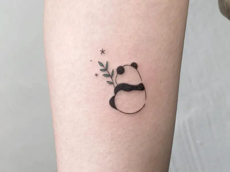 Panda tattoo on forearm for women