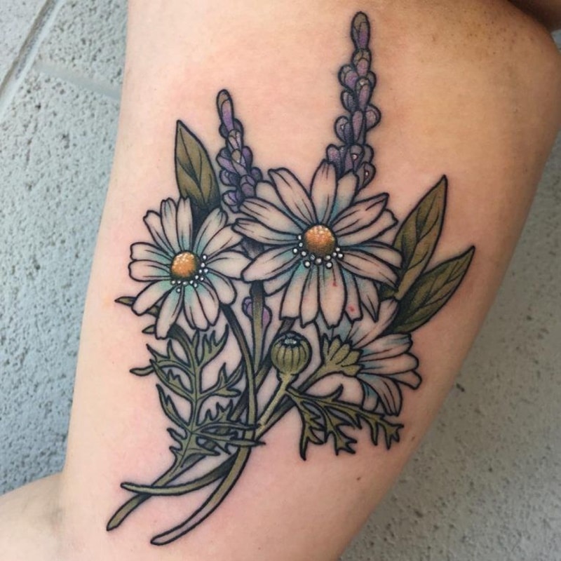 Color lavender tattoo on the biceps for women