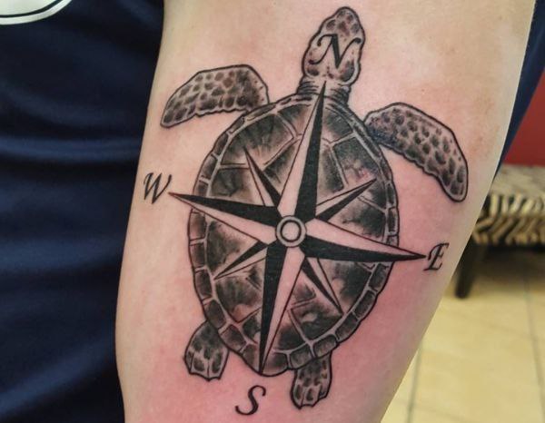 Turtle tattoo on the forearm for men