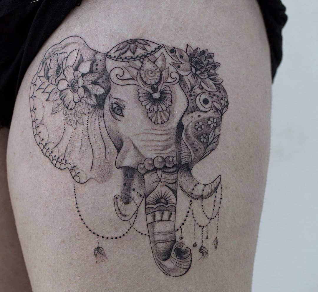 Elephant tattoo on the hip for women