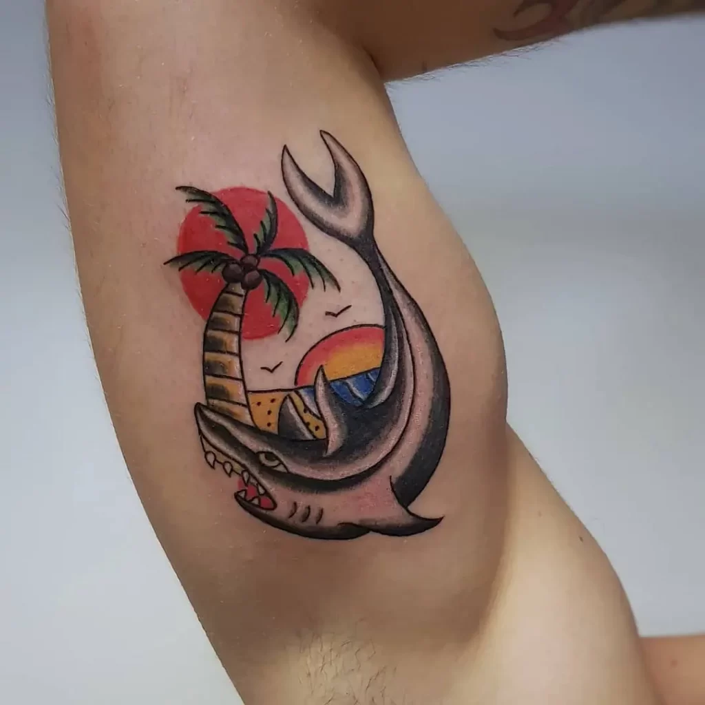 Colorful shark tattoo on the shoulder for men