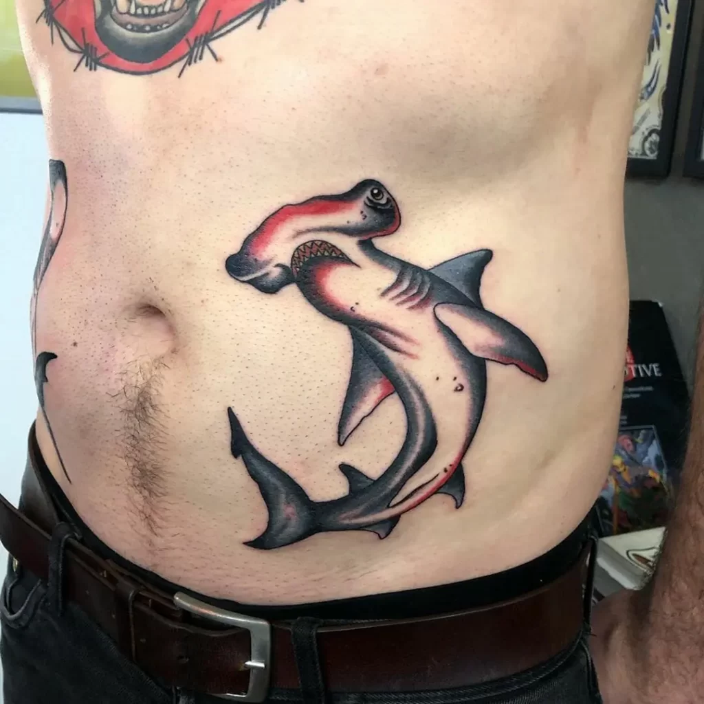 Colored shark tattoo on the stomach for men