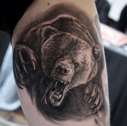 Bear tattoo on the hip for men