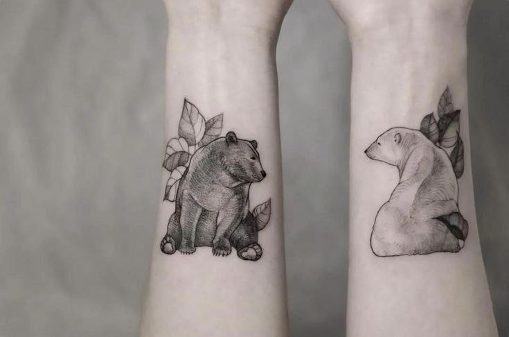 Tattoo of two bears on the forearm for women