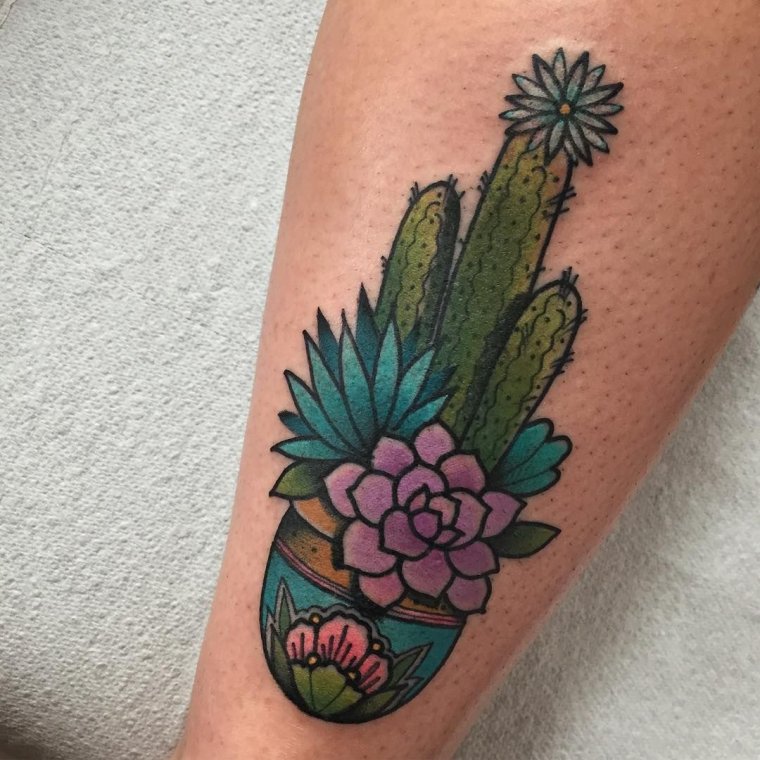 Colorful cactus tattoo on the shin for women