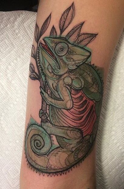 Chameleon tattoo on the forearm for women