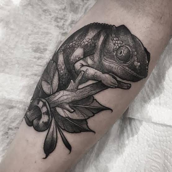 Chameleon tattoo on the shin for men