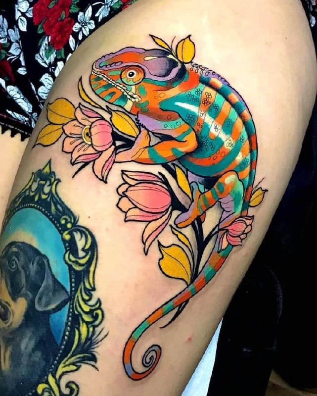 Chameleon tattoo on the thigh for women