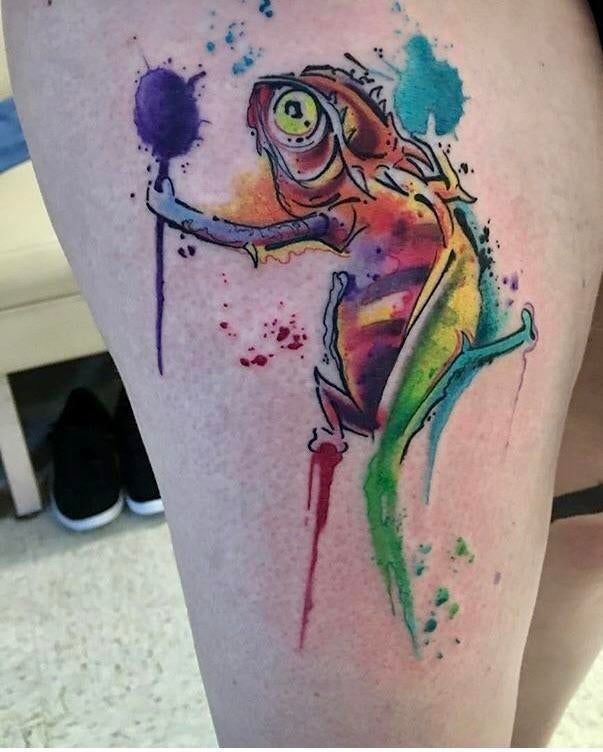 Chameleon tattoo on the thigh for women