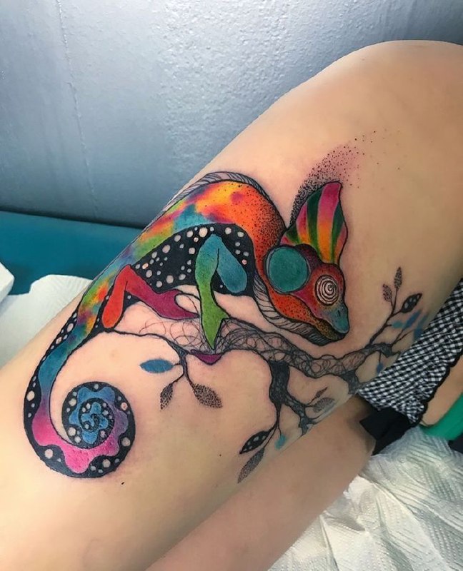 Chameleon tattoo on the hip for women