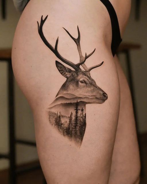 Tattoo of a deer on the hip for women