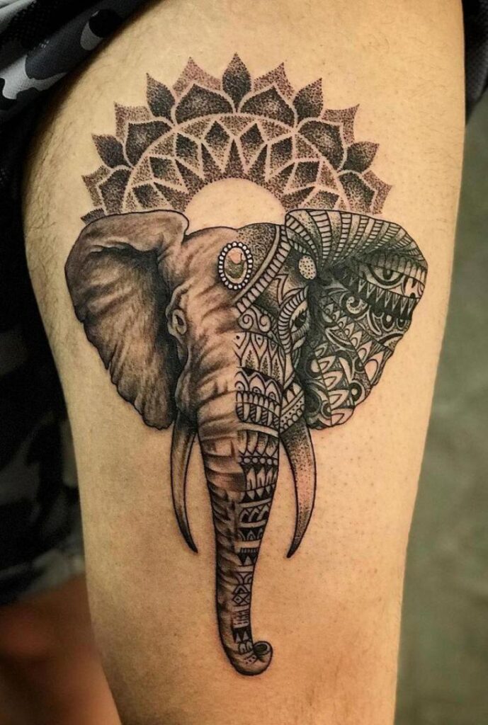 Elephant tattoo on the hip for men