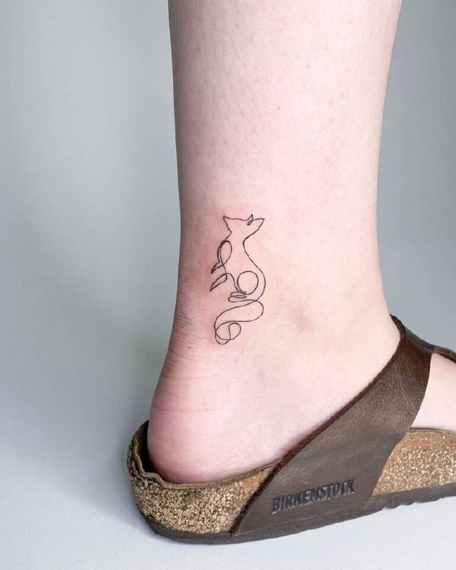 Fox tattoo on the ankle for women