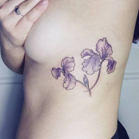 Iris tattoo on the side for women