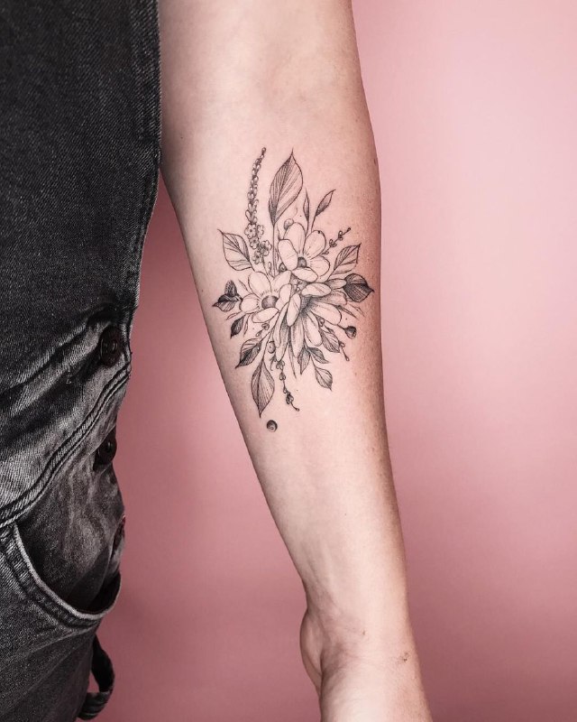 Jasmine tattoo on the forearm for men