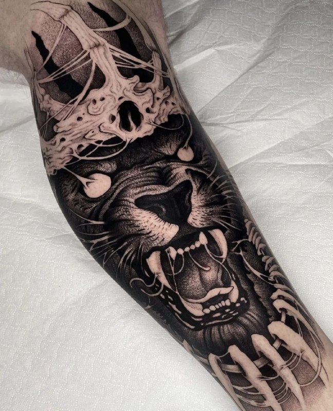 Panther tattoo on the leg for men