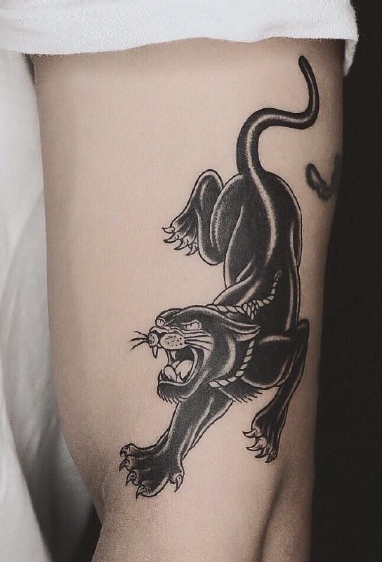 Tattoo of a panther on the shoulder for men