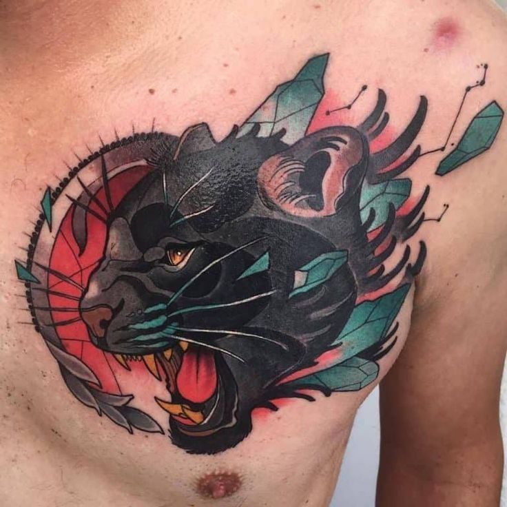 Colored panther tattoo on the chest for men