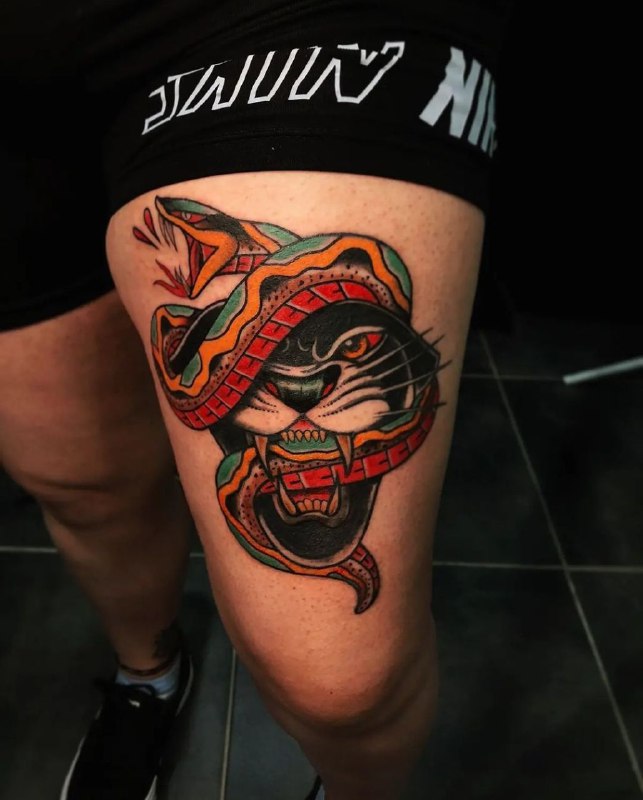 Panther and snake tattoo on the thigh for women