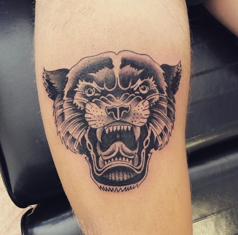 Panther tattoo on the forearm for men