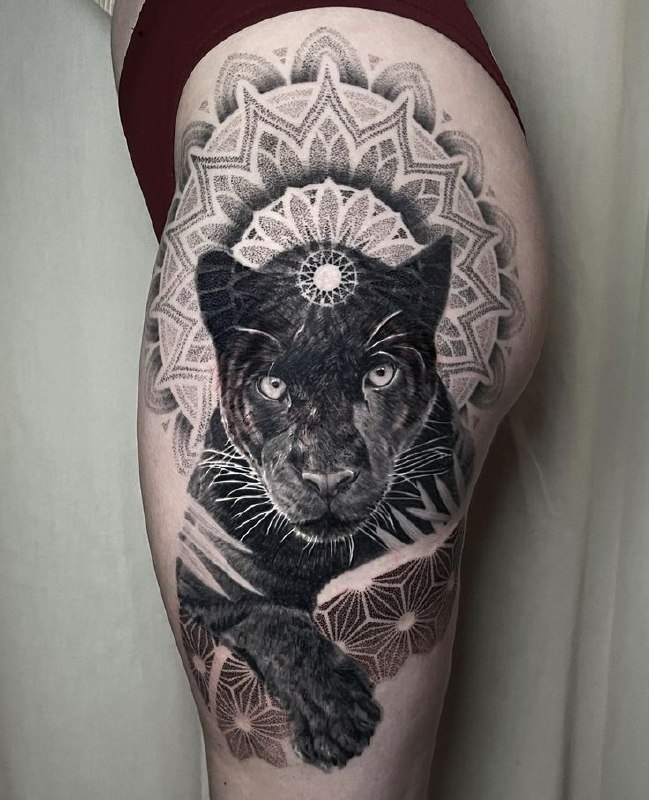 Panther tattoo on the hip for women