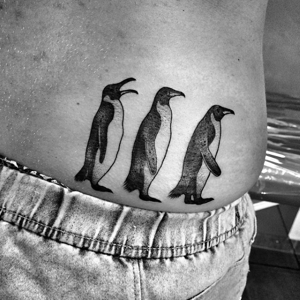 Penguin tattoo on the side for men