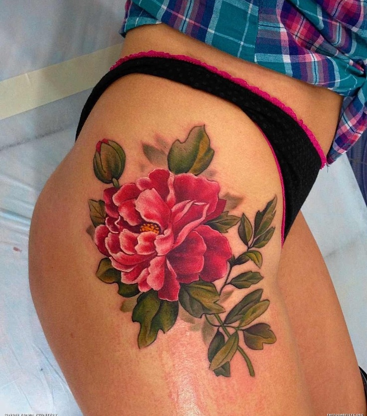 Color peony tattoo on the hip for women