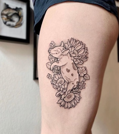 Pig tattoo on the thigh for men