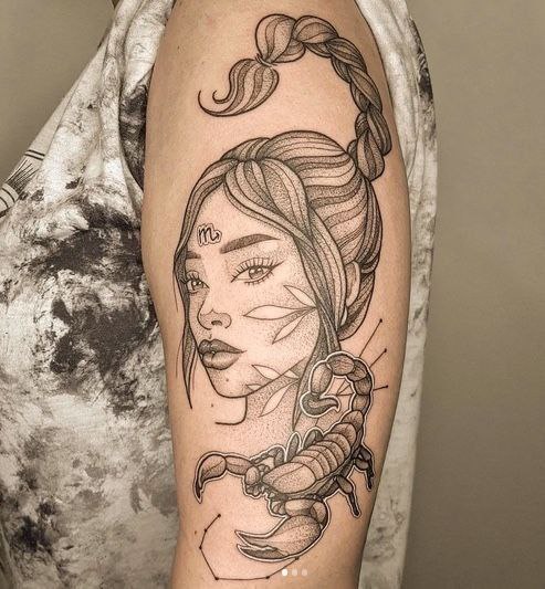 Tattoo of the zodiac sign of a scorpion on the shoulder for women