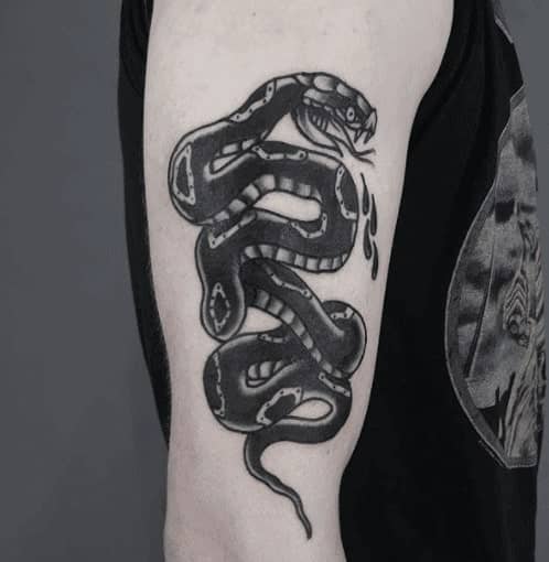 Snake tattoo on the shoulder for men