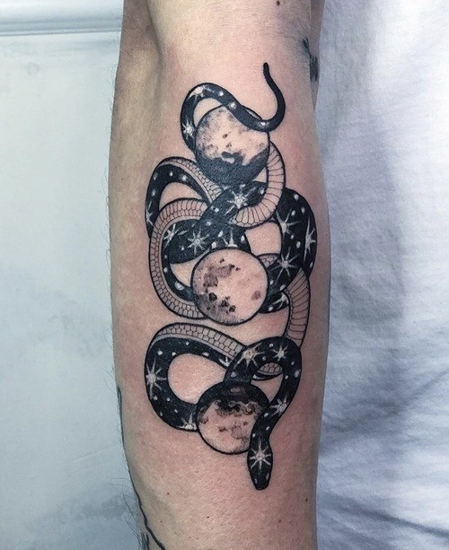 Snake tattoo on the forearm for men