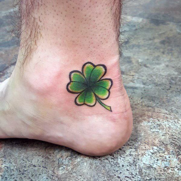 Colored clover tattoo on ankle for men