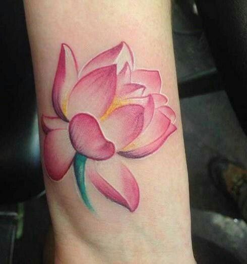 Colorful lotus tattoo on the shoulder for women